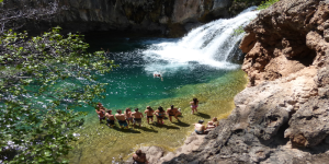 Travel through the Fossil Creek waterfall